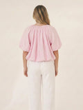 Blusa Dharma rosa de manga corta con escote abierto y ajuste relajado