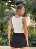 Falda Corta Canela Negro